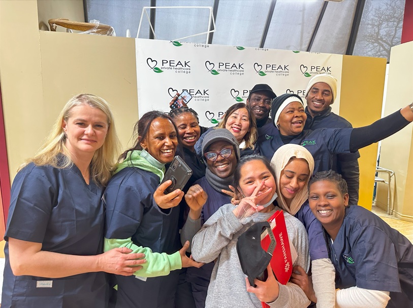 small group of students selfie sg